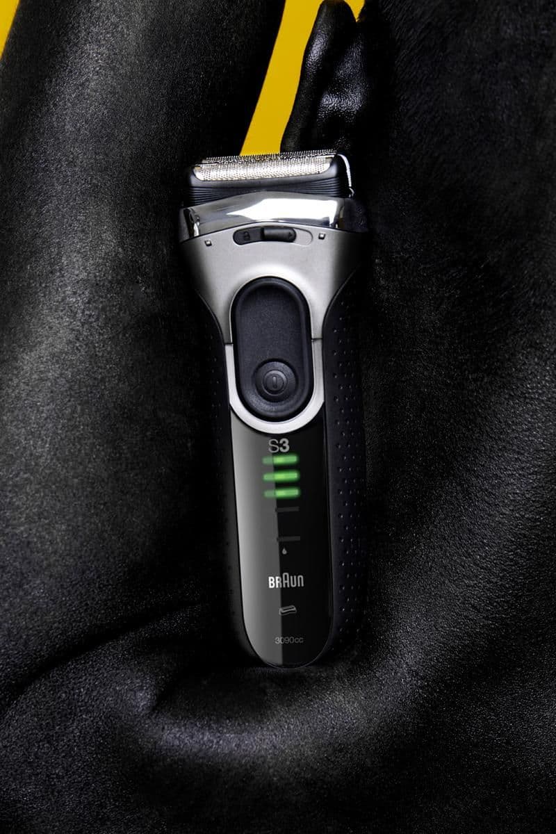 Shaver on black surface